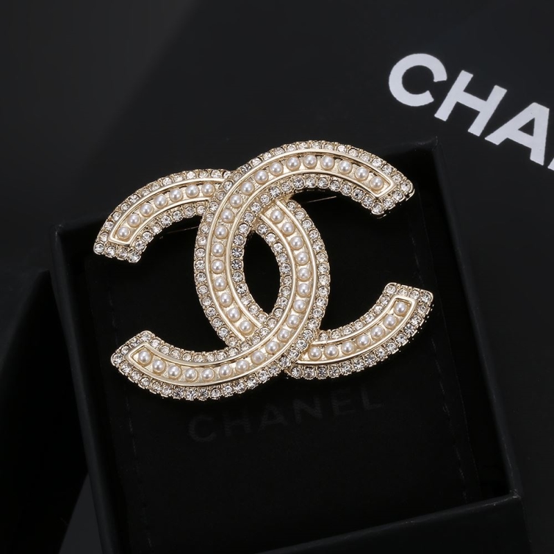 Ch*el brooches